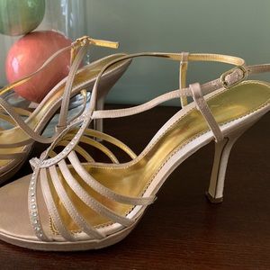 Women’s gold strapped sandals size 9.5. 4 in/heel